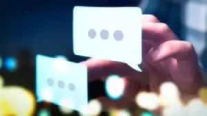 Text bubbles with three dots representing communication