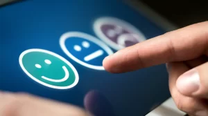 Three emojis showing satisfaction ratings