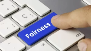 Keyboard with a blue button labeled fairness