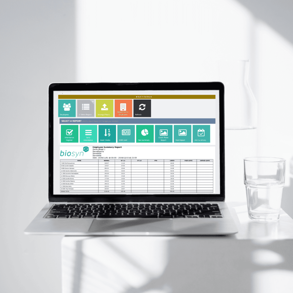 Laptop displaying BioSyn time and attendance report builder with employee breakdown summary